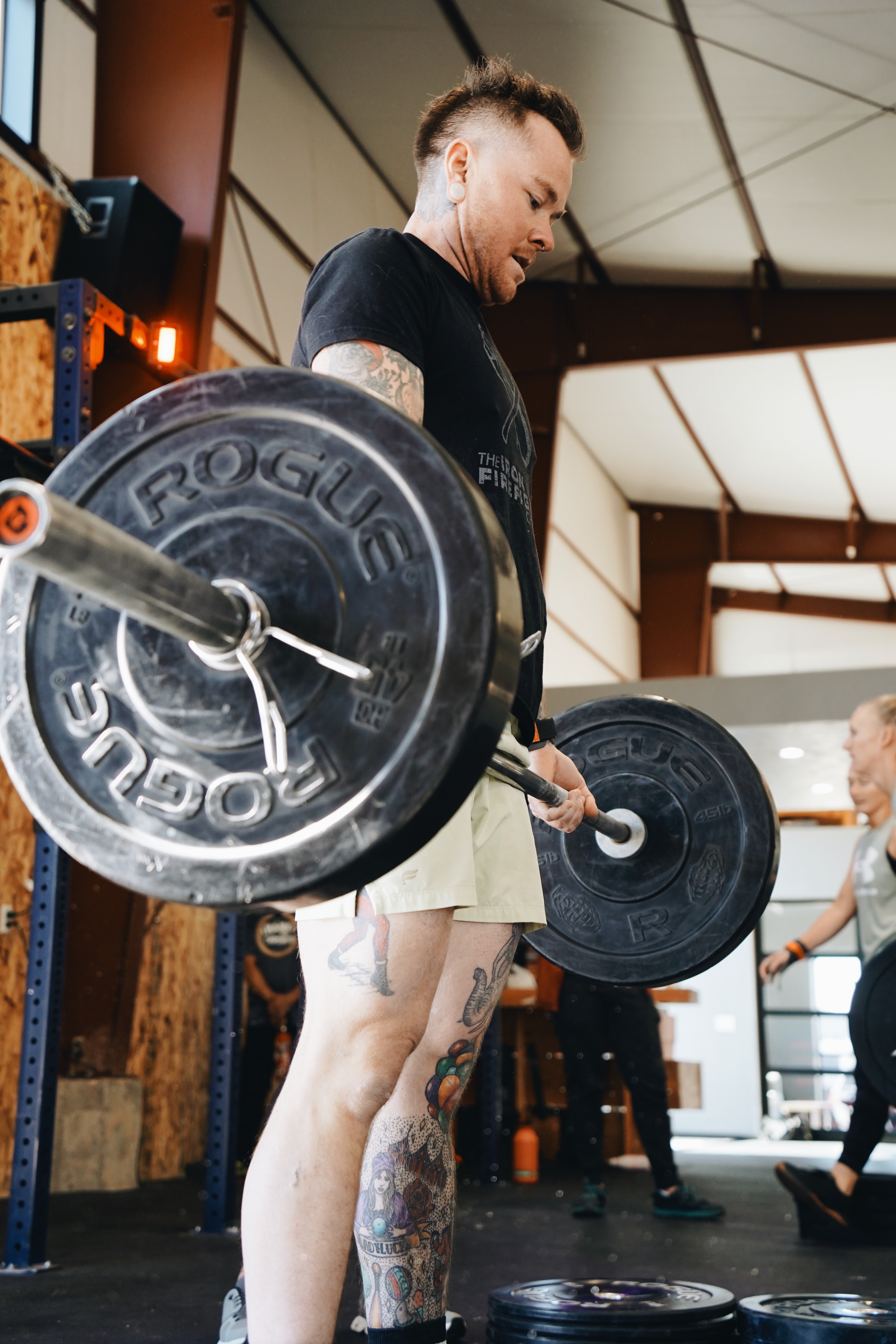 Coach reviewing training plan with member at High Mountain CrossFit Cedar City